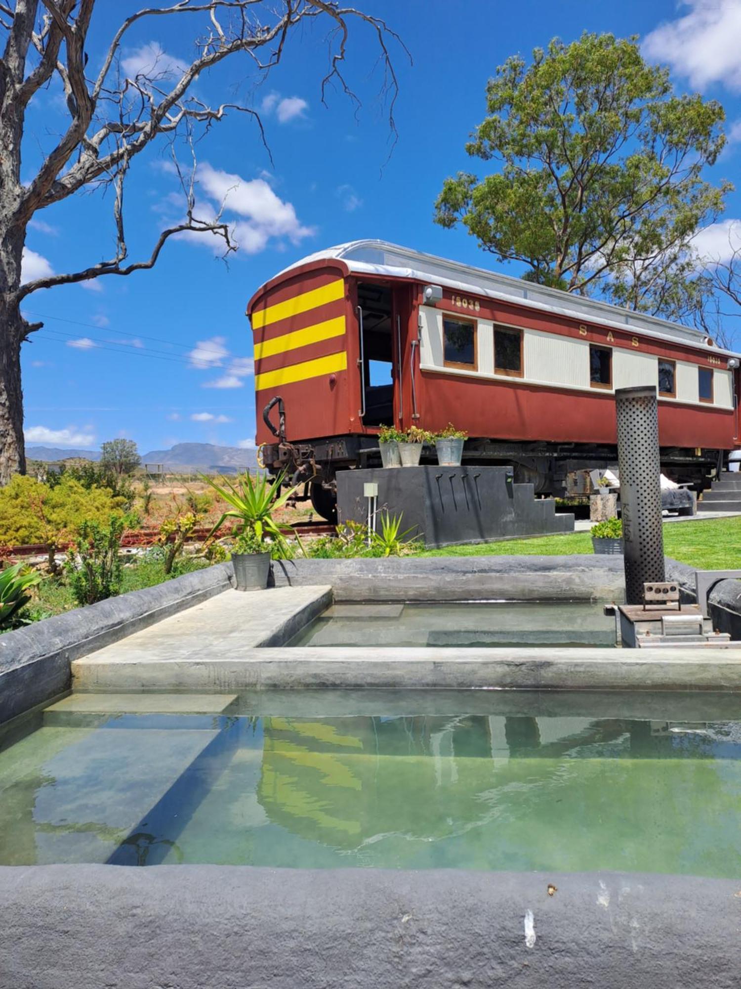 The Red Caboose Train Carriage Villa *